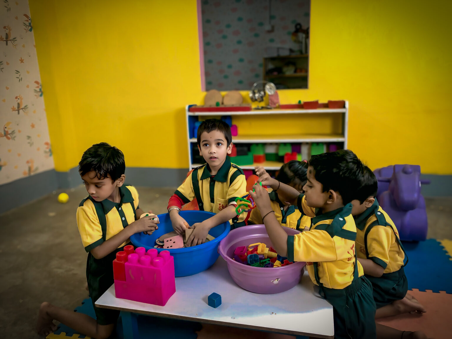 Students building with blocks.